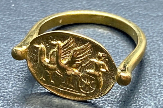 Chariot drawn by griffins